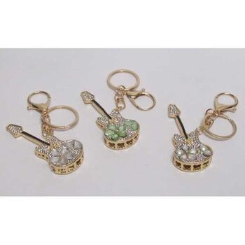bag charms, guitar, rhinestone flower