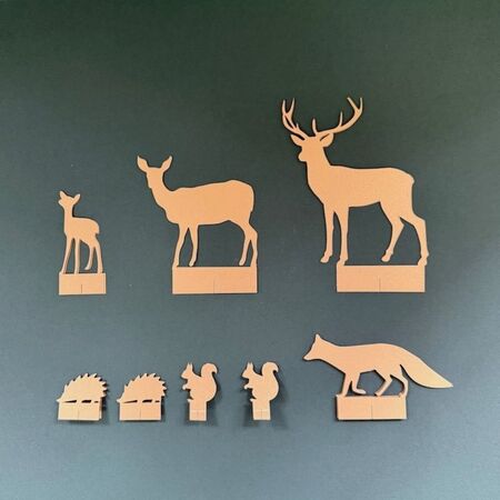 Set of animals made in gold paper