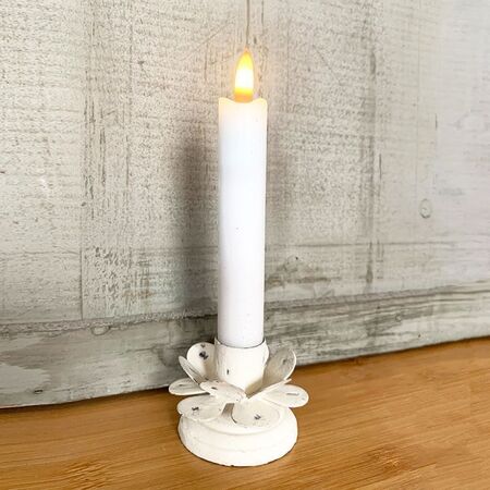 White flower shaped candle holder