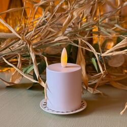 Small LED tea light with a flickering flame - H 8 cm