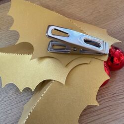 Holly leaves and bright red balls Clip