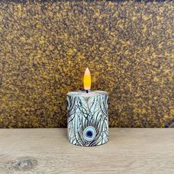 Small LED tea light with a flickering flame Peacock Leaves - H 8 cm