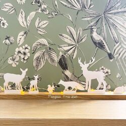 white animals scene with a led garland for customization