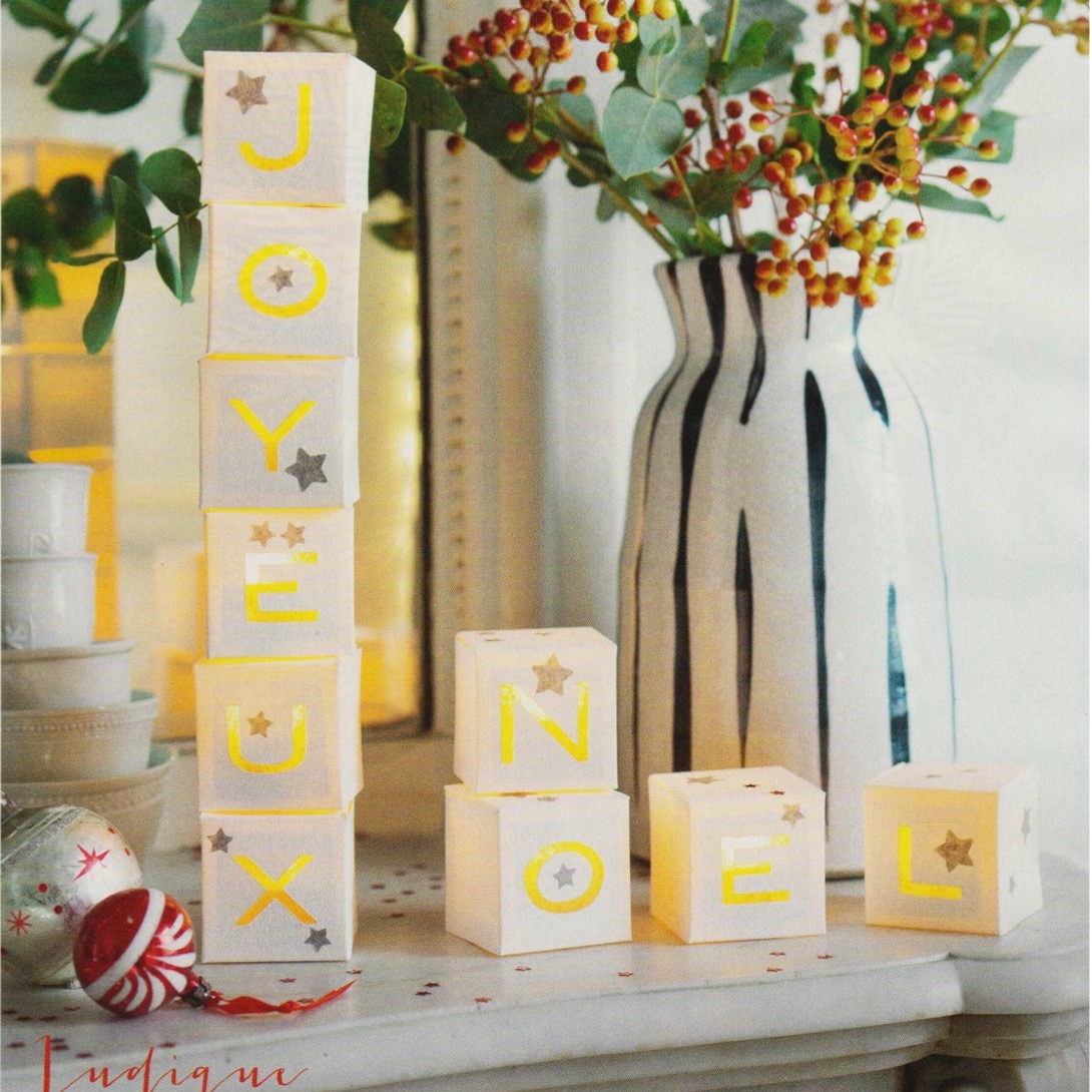 des bougies Led chauffe-plats pour illuminer des photophores de Noël