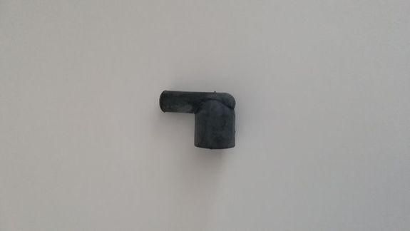 Capuchon coudé de distributeur