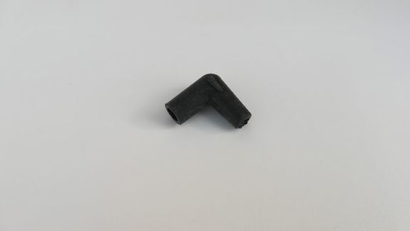 Capuchon coudé de bougie