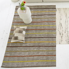 Designers Guild tapis Portminster ochre