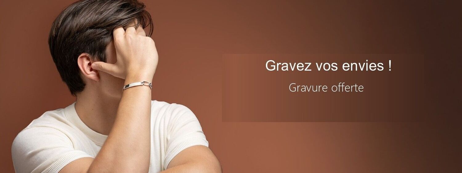 <h1>Bracelets homme</h1>Cuir-Acier-Argent<span>PROMOTION</span>- 20 %<a class="btn" href="/bracelet-personnalise-homme-gravure-755260.htm">Voir</a>