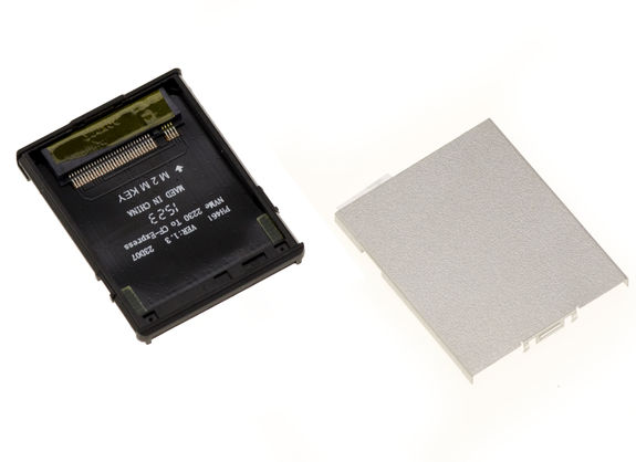 Adapter for using an SSD M2 NVMe 2230 in place of a CF Express type B card in a camera. With protective cover.