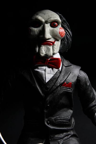 Saw figurine sonore Billy with Tricycle 30 cm Neca