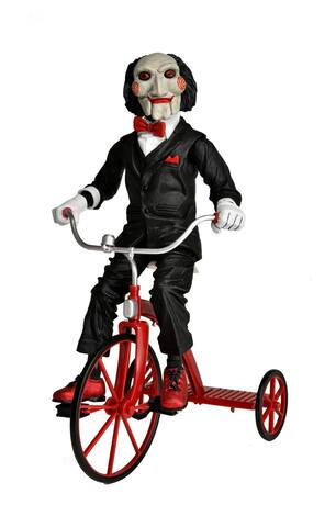Saw figurine sonore Billy with Tricycle 30 cm Neca