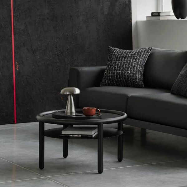 Table basse ronde noire avec étagère