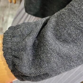 Pull avec poche motif doré