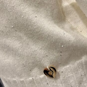 Pull col roulé maille torsadée avec sequins