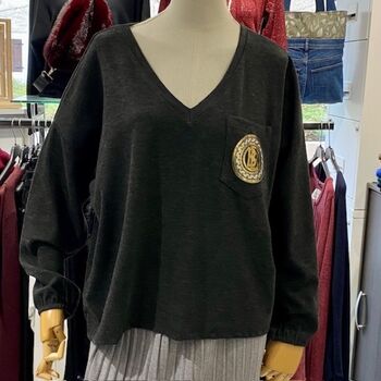 Pull avec poche motif doré