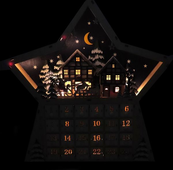 Wooden musical Advent calendar in the shape of a star with Santa and