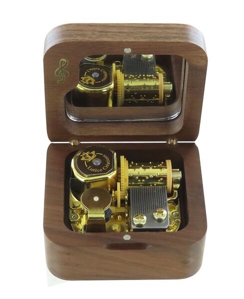 Small music box / musical box made of dark wood - Item# of this music box / musical box: BOITE-MUSIQUE-MAR02.