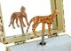 Musikalische Schmuckschatulle / Spieluhr von Trousselier mit tanzendem Leoparden und traditionellem Feder-Spielwerk mit 18 Noten – Referenz dieser musikalischen Schmuckschatulle / Spieluhr: 20-804.