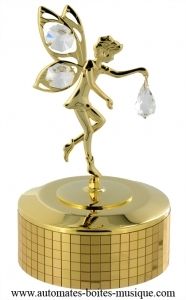 Caixa de música em metal dourado e cristal Swarovski com mecanismo musical de mola de 18 notas - Referência desta caixa de música Swarovski: 12310-01.