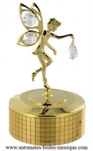 Caixa de música em metal dourado e cristal Swarovski com mecanismo musical de mola de 18 notas - Referência desta caixa de música Swarovski: 12310-02.