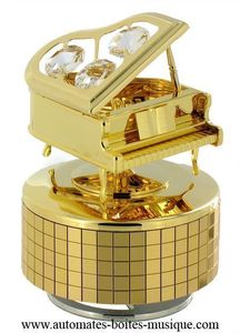 Carillon di metallo dorato e cristallo Swarovski con meccanismo musicale a molla di 18 note - Codice di questo carillon Swarovski: 12302-3.