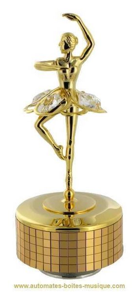 Music box made of gold colored metal and Swarovski crystal with traditional 18-note musical mechanism - Item # for this Swarovski crystal music box: 12319-3.