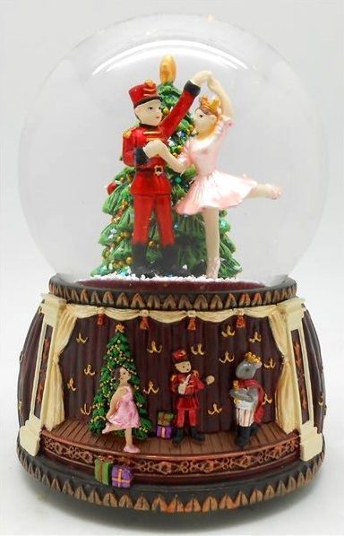 Bola de nieve musical animada de Navidad con mecanismo musical de resorte de 18 notas - Referencia de esta bola de nieve musical navideña: 55047.