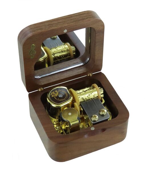 Small music box / musical box made of dark wood - Item# of this music box / musical box: BOITE-MUSIQUE-MAR14.