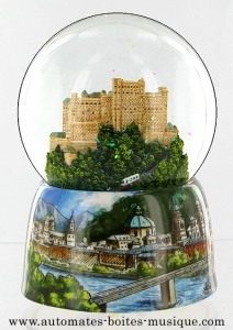 Musical snow globe made of resin with traditional 18 note spring musical mechanism - Item # for this musical snow globe: 25206
