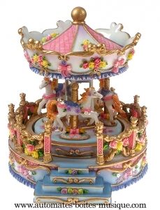 Miniature musical carousel made of polystone with traditional 18 note musical mechanism - Item # for this miniature musical carousel : 14150