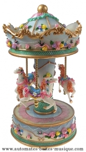 Miniature musical carousel made of resin with traditional 18 note musical mechanism - Item # for this miniature musical carousel : 14144