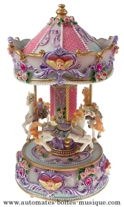 Miniature musical carousel made of resin with traditional 18 note musical mechanism - Item # for this miniature musical carousel : 14143