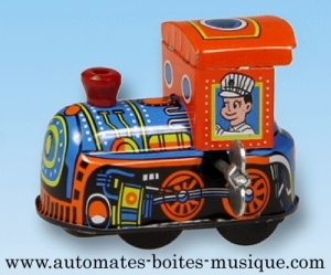 Brinquedo mecânico de colecção em metal, latão e ferro branco grafado: pequeno comboio com conductor.
