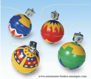 Brinquedo de coleção em metal, tola e ferro branco agrafado: brinquedo mecânico pião que uiva.