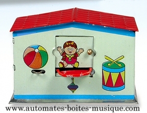 Brinquedo mecânico de colecção em metal, latão e ferro branco grafado: brinquedo mecânico mealheiro loja de brinquedos.