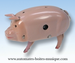 Collectable mechanical Tin Toy made of sheet metal and tin - This Collectable mechanical tin toy comes with a key to wind its spring motor - Item # for this mechanical Tin Toy made of steel : 6398772
