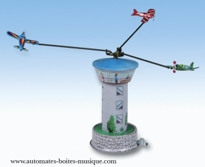 Brinquedo mecânico de coleção em metal, tola e ferro branco agrafado: robô mecânico torre de controlo com aviões.