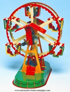 Brinquedo mecânico de coleção em metal, tola e ferro branco agrafado: brinquedo mecânico carrossel grande roda.