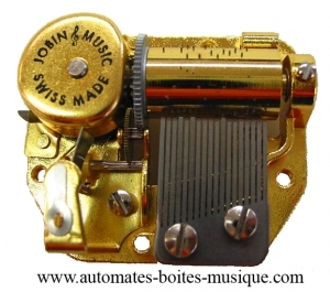 18 notes / 1 melody spring musical mechanism made in Switzerland (wind-key included) - Item# for this spring musical mechanism : Jobin 1-18