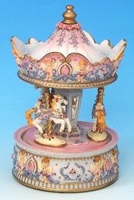 Miniature musical carousel made of resin with traditional 18 note musical mechanism - Item # for this miniature musical carousel : 14042