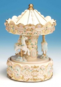 Miniature musical carousel made of polystone with traditional 18 note musical mechanism - Item # for this miniature musical carousel : 14058