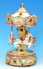Miniature musical carousel made of resin with traditional 18 note musical mechanism - Item # for this miniature musical carousel : 14039