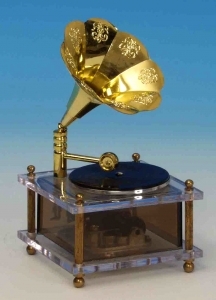 Spieluhr miniatur Musikinstrument in Form eines Grammophons aus Kunstharz.