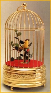 Mechanical singing bird automaton in a golden cage made of metal - Item# for this mechanical singing bird automaton : OC-103