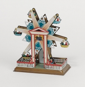 Collectable mechanical Tin Toy made of sheet metal and tin - This Collectable mechanical tin toy comes with a key to wind its spring motor - Item # for this mechanical Tin Toy made of steel : MS435