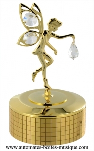 Carillon di metallo dorato e cristallo Swarovski con meccanismo musicale a molla di 18 note - Codice di questo carillon Swarovski: 12310.