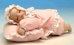 Musical newborn baby automaton made of porcelain with traditional 18 note musical mechanism - Item# for this musical newborn baby automaton : 20226