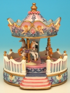 Miniature musical carousel made of polystone with traditional 18 note musical mechanism - Item # for this miniature musical carousel : 14111