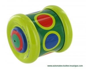 Come back roller wheel made of metal : toy made of green metal in the shape of a wheel.