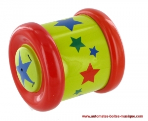 Come back roller wheel made of metal : toy made of yellow metal in the shape of a wheel.